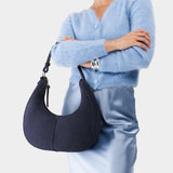 Alaska Blue Large | Crescent shaped shoulder bag with zipper closure and adjustable strap