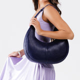 Cobalt Large | Crescent shaped shoulder bag with zipper closure and adjustable strap