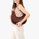 Cognac Large | Crescent shaped shoulder bag with zipper closure and adjustable strap
