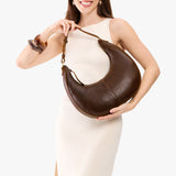 Coldbrew Large | Crescent shaped shoulder bag with zipper closure and adjustable strap