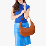 Honey Large | Crescent shaped shoulder bag with zipper closure and adjustable strap
