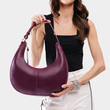 Lollipop Large | Crescent shaped shoulder bag with zipper closure and adjustable strap