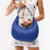 Molino Blue Large | Crescent shaped shoulder bag with zipper closure and adjustable strap