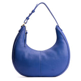 Molino Blue Large | Crescent shaped shoulder bag with zipper closure and adjustable strap