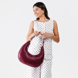 Orchid Large | Crescent shaped shoulder bag with zipper closure and adjustable strap