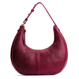 Orchid Large | Crescent shaped shoulder bag with zipper closure and adjustable strap