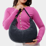 Peppercorn Large | Crescent shaped shoulder bag with zipper closure and adjustable strap