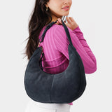Peppercorn Large | Crescent shaped shoulder bag with zipper closure and adjustable strap