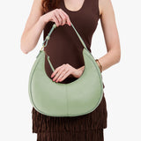 Pistachio Large | Large crescent shaped shoulder bag with zipper closure and adjustable strap
