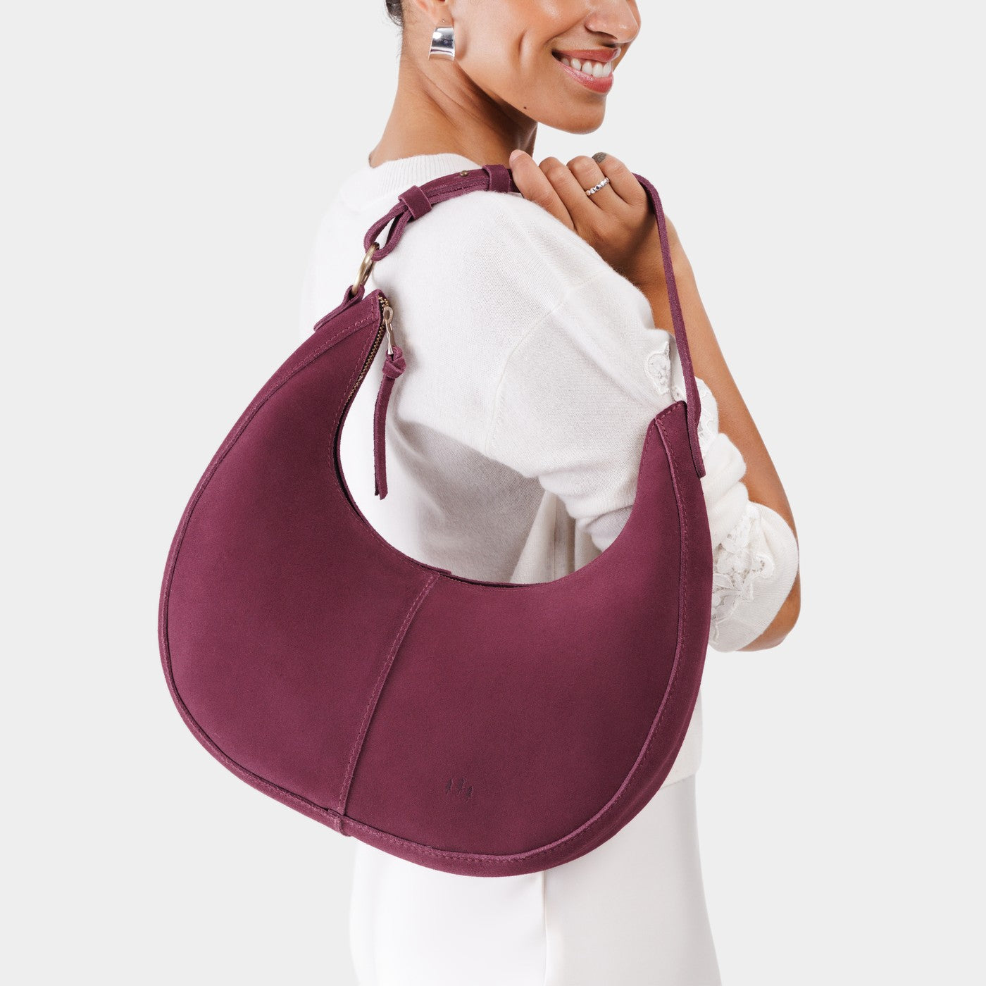 Superbloom*Large | Crescent shaped shoulder bag with zipper closure and adjustable strap