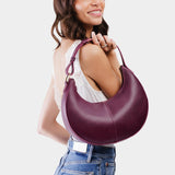 Lollipop Classic | Crescent shaped shoulder bag with zipper closure and adjustable strap