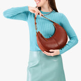 Nutmeg Classic | Crescent shaped shoulder bag with zipper closure and adjustable strap
