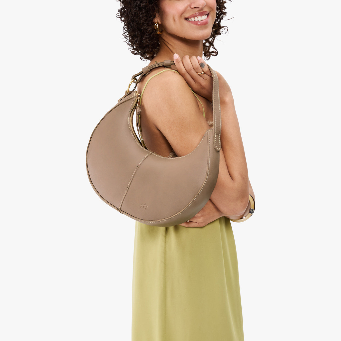 Stone*Classic | Crescent shaped shoulder bag with zipper closure and adjustable strap