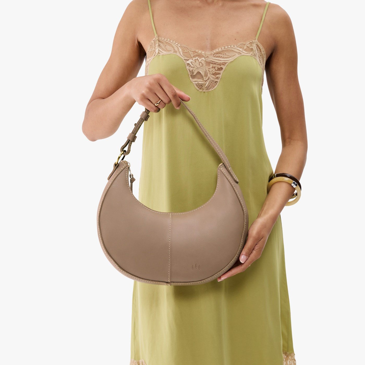Stone*Classic | Crescent shaped shoulder bag with zipper closure and adjustable strap