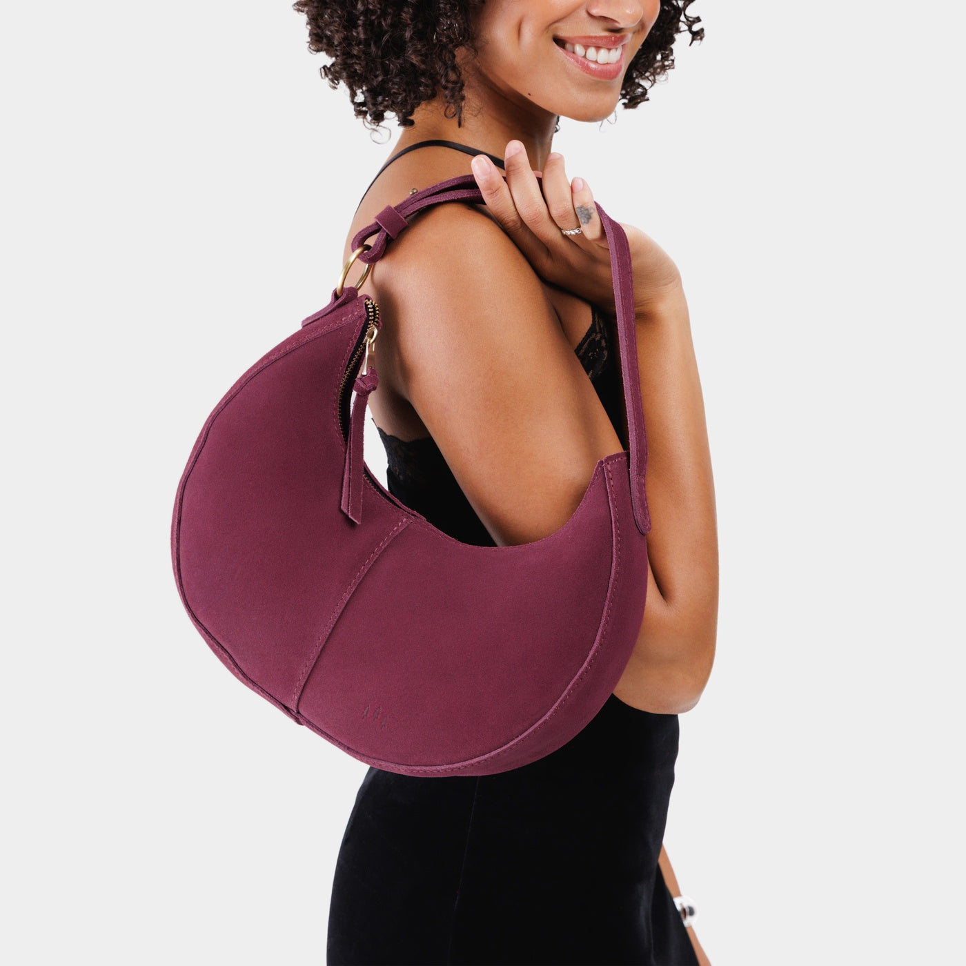 Superbloom*Classic | Crescent shaped shoulder bag with zipper closure and adjustable strap