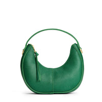 Bacalar | Crescent shaped shoulder bag with zipper closure and gold accents