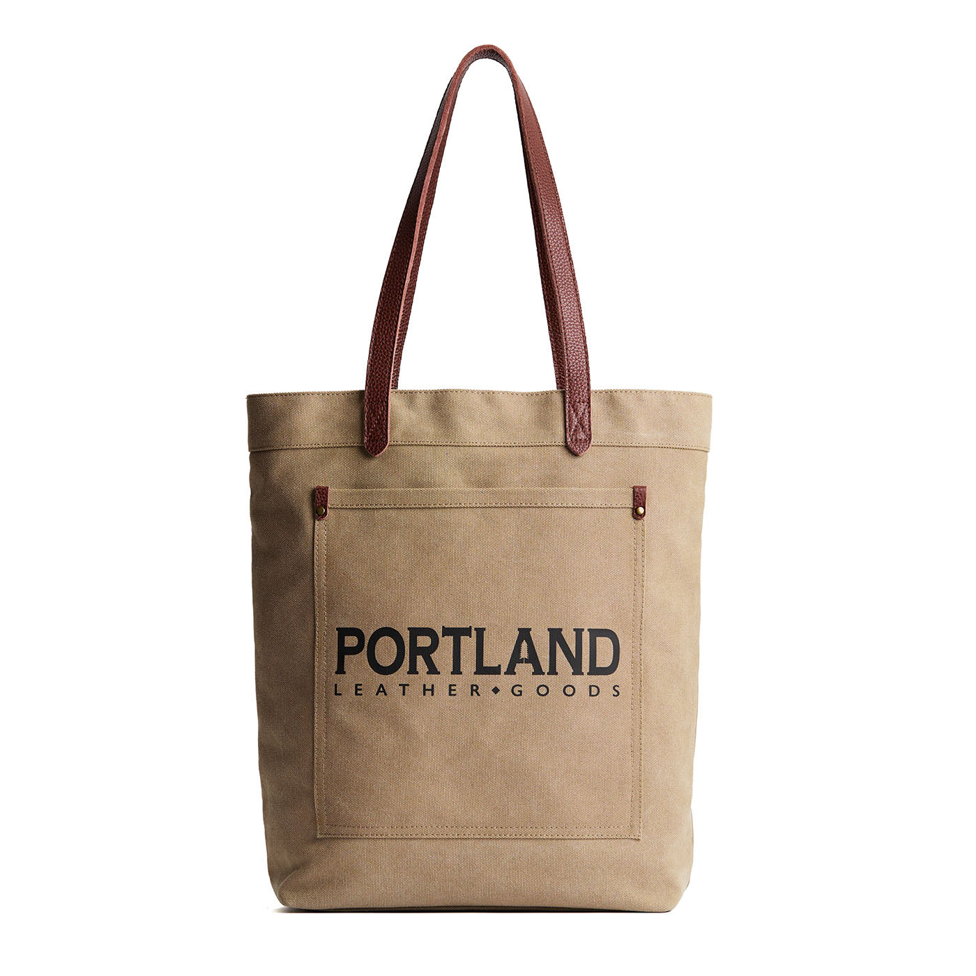 Beige tote bag with leather handles and 'Portland Leather Goods' text