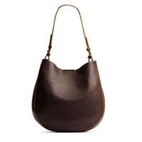 Coldbrew*Large | Rounded shoulder bag with adjustable strap on a white background