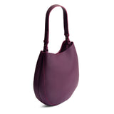 Plum Large | Rounded shoulder bag with adjustable strap on a white background