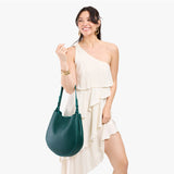 Sea Glass Large | Model carrying round leather purse with adjustable shoulder strap