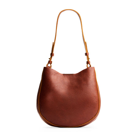 Nutmeg*Large | Rounded shoulder bag with adjustable strap on a white background