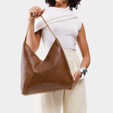 Asheville Oversized | Model wearing large shoulder bag with magnetic snap 