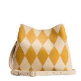 Sun Glaze | Symmetrical bucket bag with latch closure and removable crossbody strap