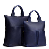 Cobalt | A comparison image of a Large and Small Pembroke Crossbody Clutch
