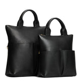 Pebbled--black | A comparison image of a Large and Small Pembroke Crossbody Clutch