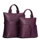 Plum | A comparison image of a Large and Small Pembroke Crossbody Clutch