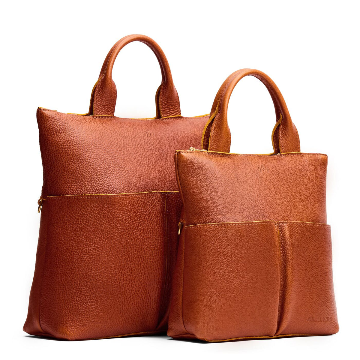 Sienna | A comparison image of a Large and Small Pembroke Crossbody Clutch