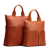 Sienna | A comparison image of a Large and Small Pembroke Crossbody Clutch
