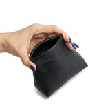 Pebbled--black | Hand holding leather coin pouch with scalloped edge and three Portland leather tree emblems open