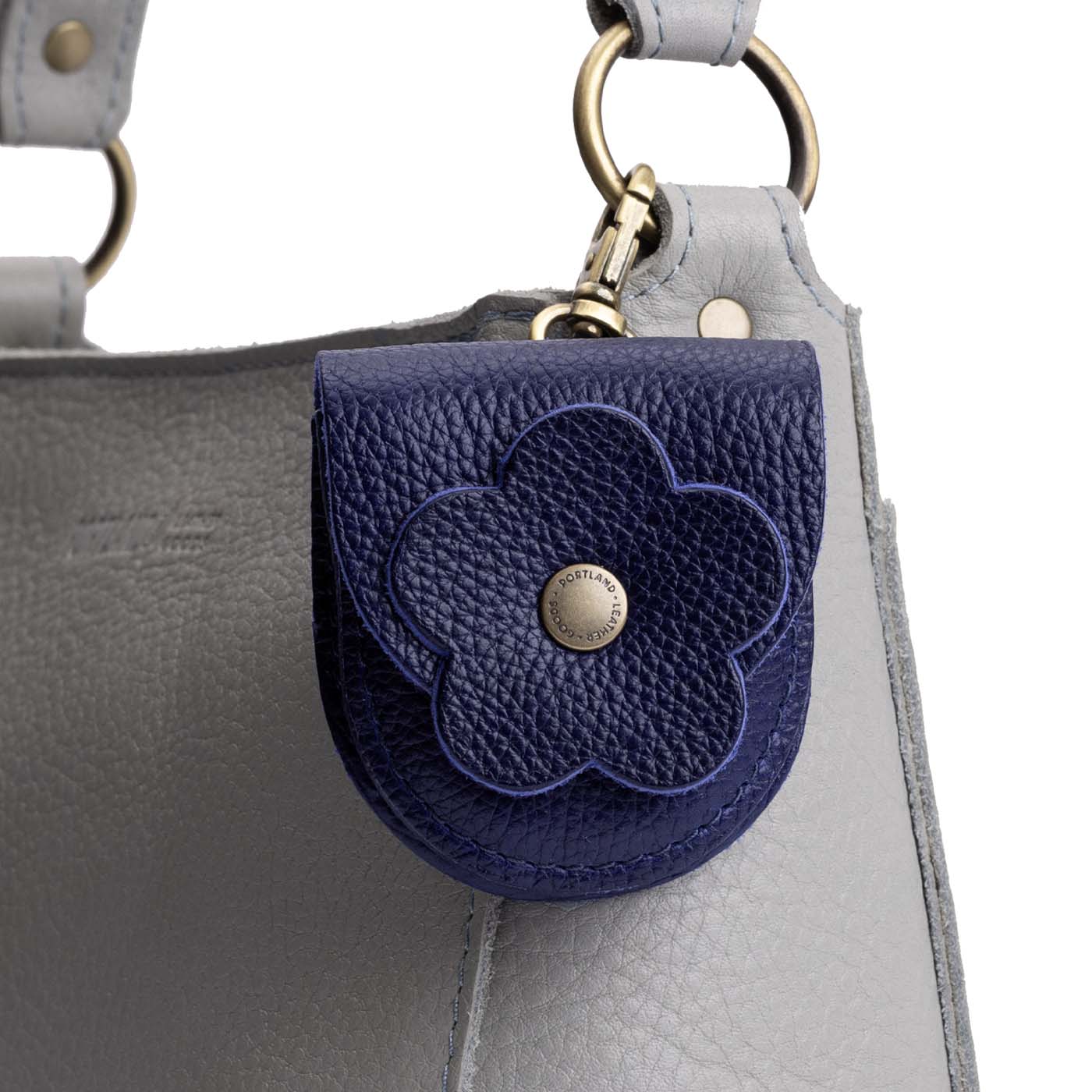 Cobalt | U shaped pouch with leather flower applique