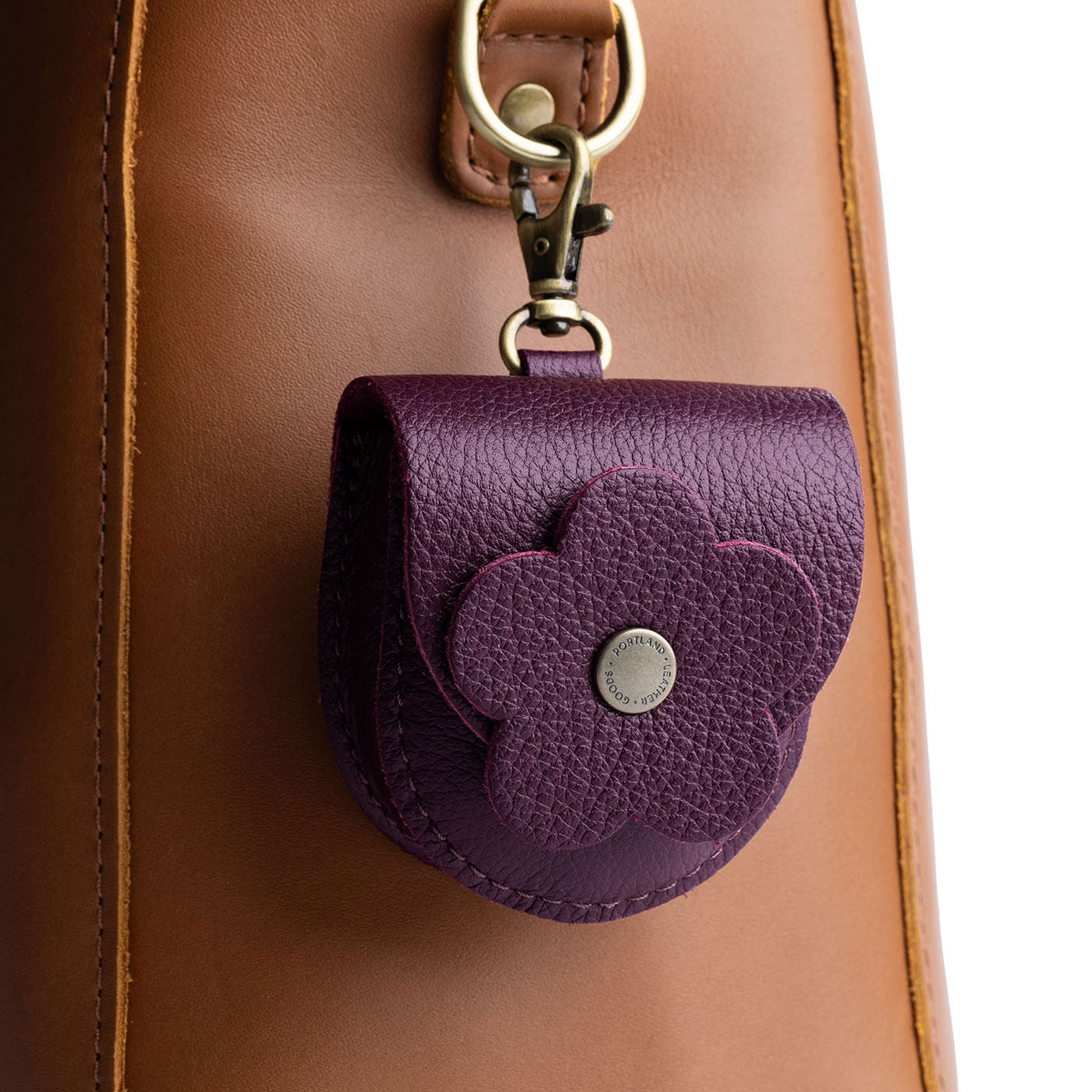Plum | U shaped pouch with leather flower applique