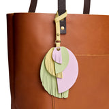 Citrine Beat | Intricately cut leather shapes and fringe