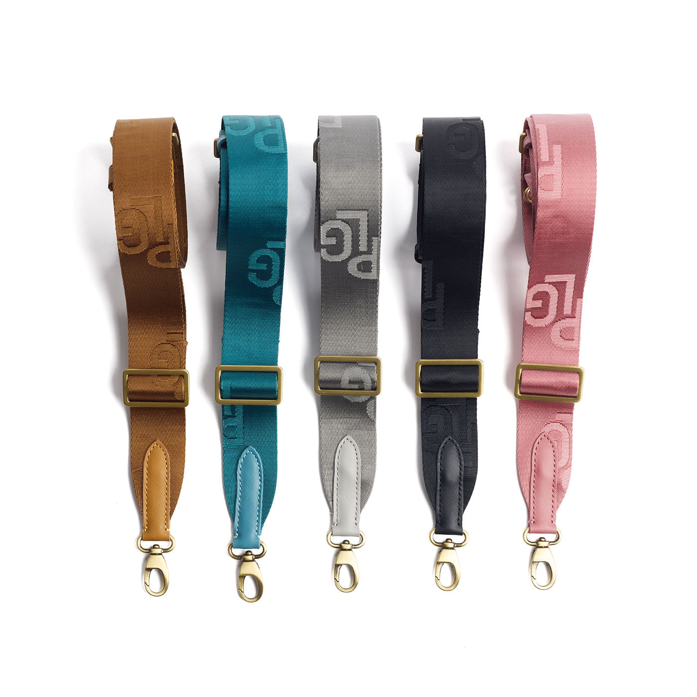 All Variants | Five colorful strap options with brass-toned hardware on a white background