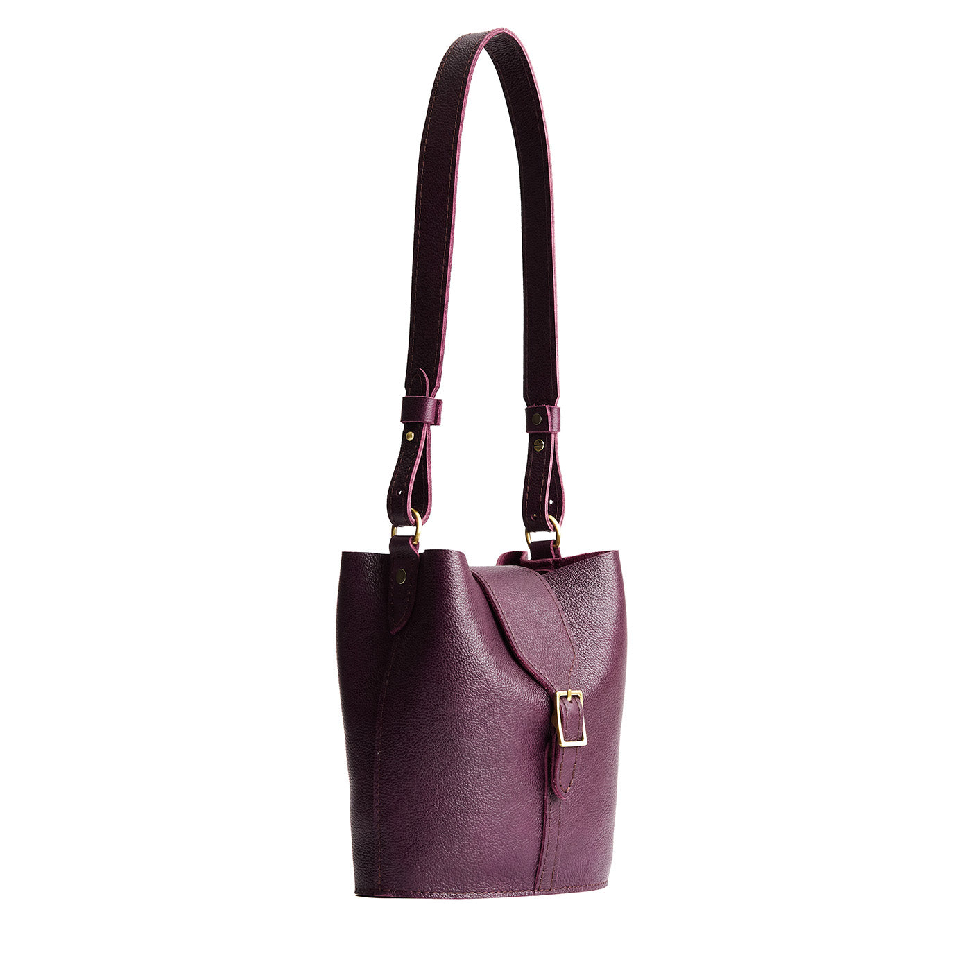 Plum | Leather bucket shoulder bag with adjustable strap and magnetic closure on a white background
