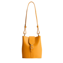 Sunflower | Leather bucket shoulder bag with adjustable strap and magnetic closure on a white background