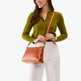 Sienna Large | Model wearing a zip top crossbody bag with detachable strap