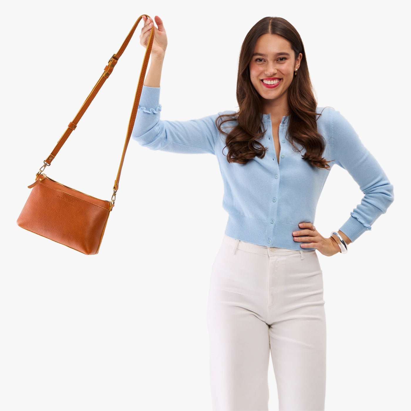 Sienna*Classic | Model wearing a zip top crossbody bag with detachable strap