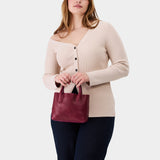 Orchid Small | Petite tote purse with  structured leather handles and crossbody strap