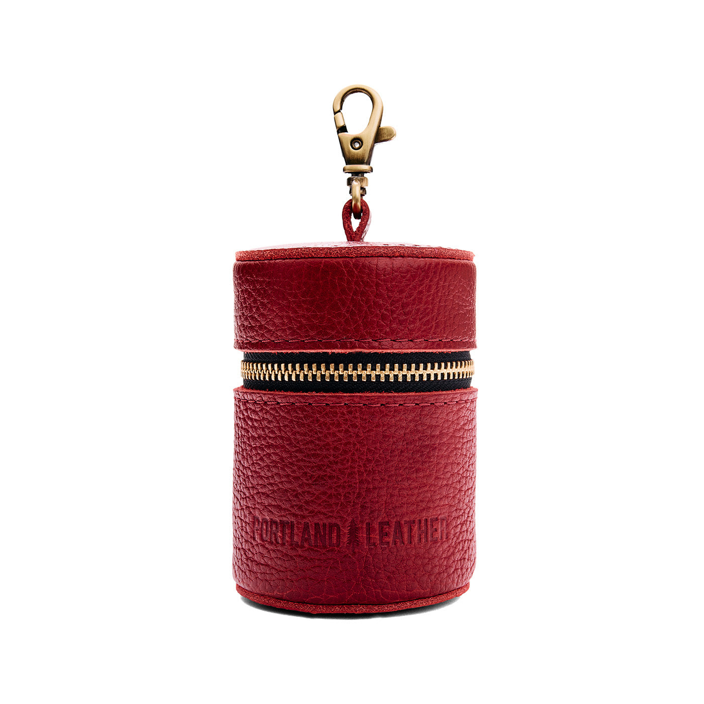 Chili Red | Cylindrical shaped pouch with a gold zipper and swivel lobster claw clasp