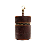 Coldbrew | Cylindrical shaped pouch with a gold zipper and swivel lobster claw clasp
