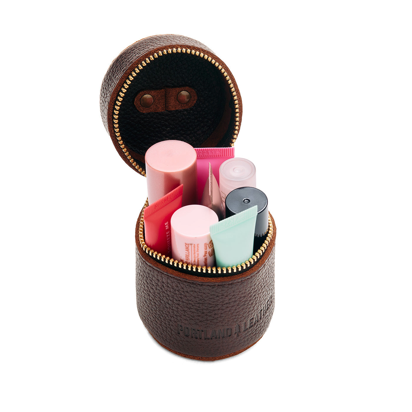 Coldbrew | Cylindrical shaped pouch with a gold zipper and swivel lobster claw clasp