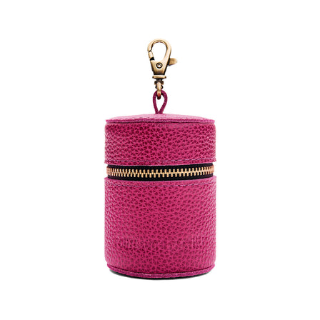 Cosmo | Cylindrical shaped pouch with a gold zipper and swivel lobster claw clasp