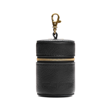 Pebbled--black | Cylindrical shaped pouch with a gold zipper and swivel lobster claw clasp