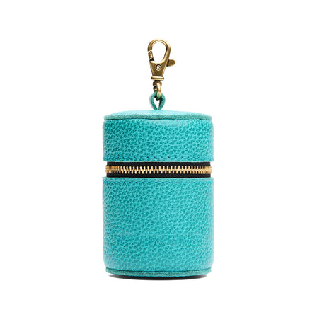 Seafoam | Cylindrical shaped pouch with a gold zipper and swivel lobster claw clasp