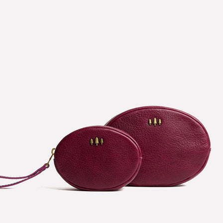 Orchid*Small | Oval shaped pouch with zipper and wristlet strap