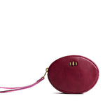 Orchid Small | Oval shaped pouch with zipper and wristlet strap